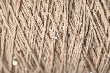 natural beige yarn texture. Soft wool thread background for eco fashion, textile branding, crafts, or interior design. Perfect for handmade, organic, and sustainable lifestyle visuals.