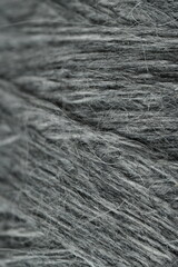 gray wool yarn texture. Soft natural fiber background for eco fashion, textile branding, crafts, or interior design. Perfect for handmade, organic, and sustainable lifestyle visuals.