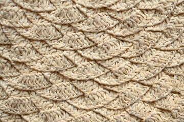 macro texture of light brown paper hat as background, close up texture of panama hat, paper for panama hat	