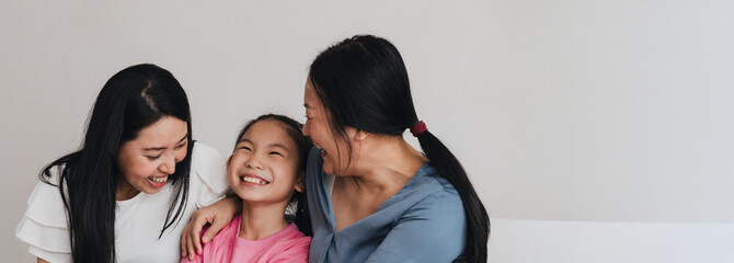 Joyful family moment shared by three individuals celebrating love and inclusion in a warm, supportive environment
