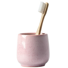 A pink ceramic holder with a wooden toothbrush, showcasing a minimalist design and eco-friendly materials.