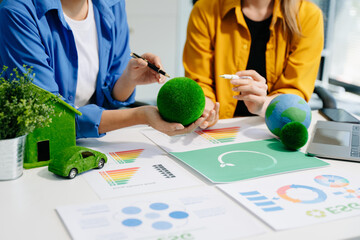 Business team people planning hand using laptop for working technology and business Net zero