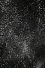 black leather jacket close up, macro black leather jacket texture, soft yet rugged, capturing the grain and stitch details with a worn-in feel