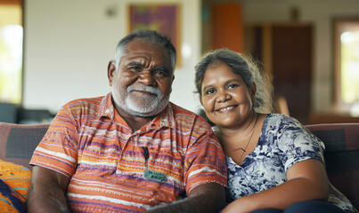 Happy Aboriginal senior couple together in a bright room, family at home, generated ai