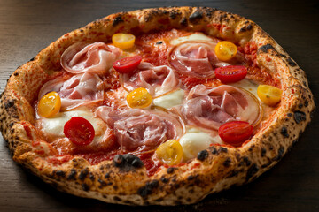 pizza with bacon, cherry tomatoes and buffalo mozzarella
