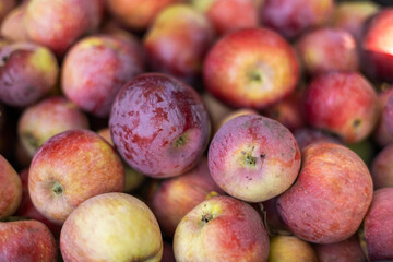 heap of ripe red apples as background
