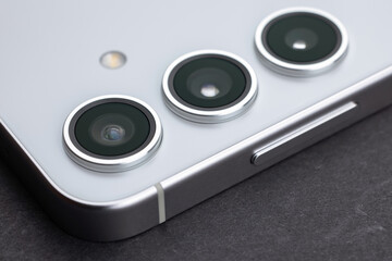 Smartphone cameras close-up. A universal set of cameras in a modern mobile phone.