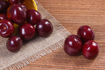 Fresh ripe cherries on jute cloth. Healthy dessert or snack