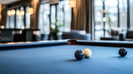 Blue billiard table set with white balls creates an inviting atmosphere in a lively bar, perfect for socializing and gameplay