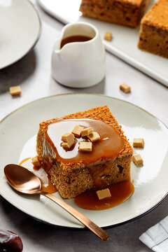 Easy Sticky Toffee Pudding is a deliciously gooey sponge cake drenched in warm toffee sauce.
