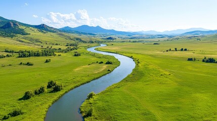 Aerial View Of Winding River Through Lush Green Fields And Hills
