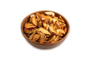 Dried Apples in wooden bowl isolated on white. Side view, close up
