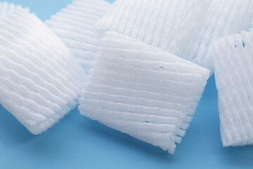 Fruit foam net for protection on blue background. Top view