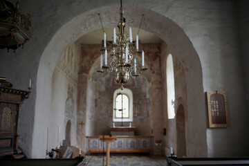church interior with candelabra