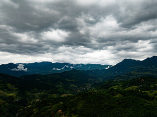 Drone aerial view of landscape mountains view in sunset or sunrise time,High angle view image over countryside at northern Vietnam