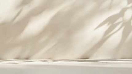 Obraz premium Minimalist neutral background with soft natural shadows of leaves, perfect for product displays, branding, and elegant design concepts