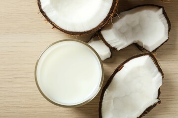 Glass of milk with coconuts on the table