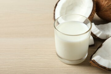 Glass of milk with coconuts on the table