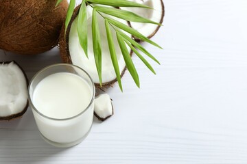 Glass of milk with coconuts on the table