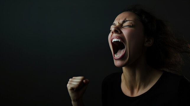 Woman screaming shouting angry with furious mad emotion