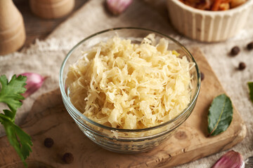 Fermented cabbage or sauerkraut in a glass bowl