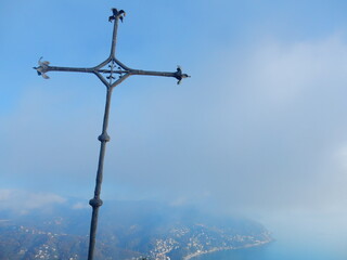 the cross on top of Comunaglia mount, Liguria, Italy