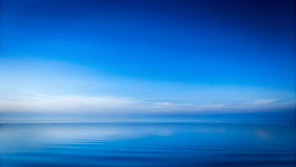 Fototapeta premium Watercolor blue tones background in soft sky blue and navy evoking serenity and introspection for Blue Monday reflection with copy space 