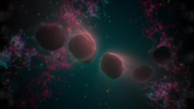 animation of dark red cancer cells replicating with glowing particles in background