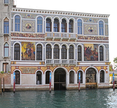 Golden Facade of Palace Mula Morosini at Grand Canal in Venice Italy