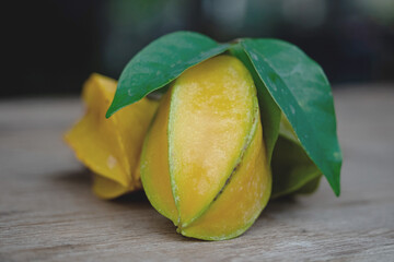 Close up of Carambola fruit on wood table,selective focus
