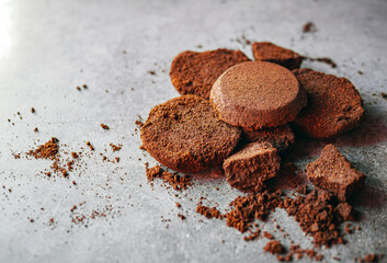 Close-up of coffee grounds from espresso machine. coffee ground on gray background
