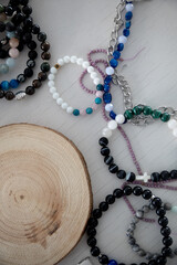 Richness and Good Fortune Concept. Black Lucky Stones Bracelet on a white background.