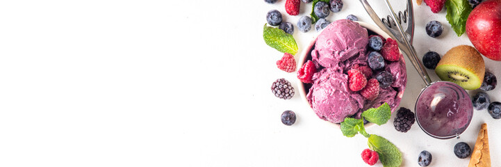 Homemade fruit and berry sorbet ice cream, portioned bowl with healthy fruit and berry yogurt...
