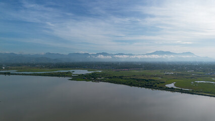 Aerial view of the lake and mountain in the morning at Gorontalo, Indonesia