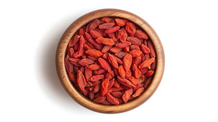 Dried red goji berries in wooden bowl center top down view, white background