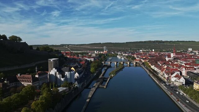 Aerial drone view of the Main River featuring the historic Old Main Bridge (Alte Mainbr&uuml;cke) in W&uuml;rzburg, Germany. 