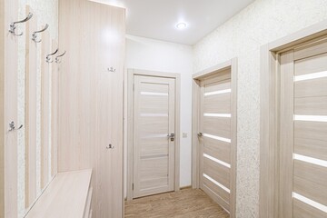 standard room interior apartment. room doors, renovation corridor lobby entrance hall