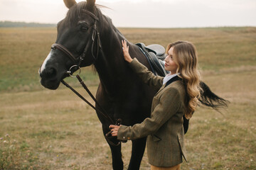 Obraz premium Woman Bonding with Horse in Countryside During Autumn
