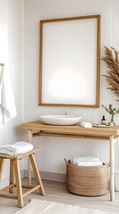 A Scandinavian-inspired bathroom with natural wooden accents and a framed blank canvas.
