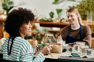 Participants joyfully craft unique succulent arrangements, sharing laughs and creativity together