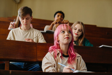 Students Studying Together in a Classroom Setting at an Academic Lecture