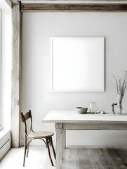 A simple whitewashed dining space with rustic wooden floors and a blank white frame.