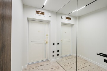 standard room interior apartment. room doors, renovation corridor lobby entrance hall