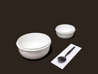set of white bowls and a spoon