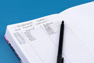 Planner tracker for Retirement Funds Planning and early retirement goals. Financial Independence, Retire Early. Deposit and Balance, total amount. Concept of financial independence, wealth management.