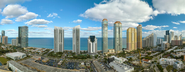 High angle view of Sunny Isles Beach city with expensive highrise hotels and condo buildings on...