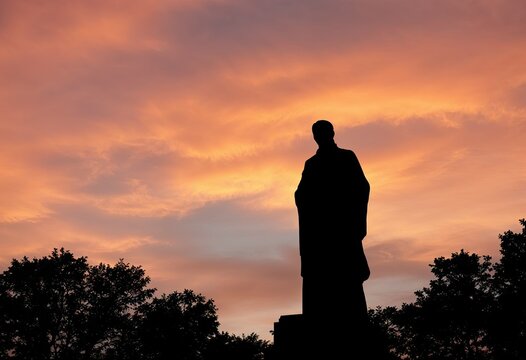 low angle view of silhouette statue against sky - Powered by Adobe
