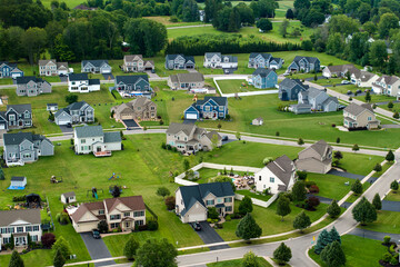 Top view of expensive two story private houses in Rochester NY suburbia. New family homes in upscale community. Real estate development in american suburbs