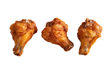 Three Crispy Fried Chicken Drumsticks on White Background.