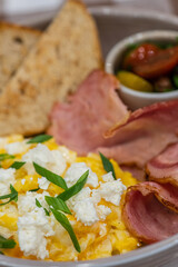 Delicious breakfast with eggs, bacon, cheese and more